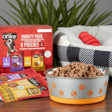 Ol' Roy variety pack with bowl of dog food and nearby pouches