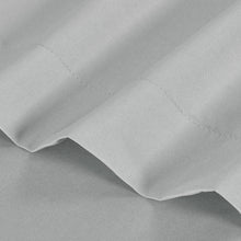Light silver gray flat bed sheet with stitched seam and folded edge detail