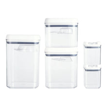Set of clear flip-top storage containers with blue seal bands in multiple sizes