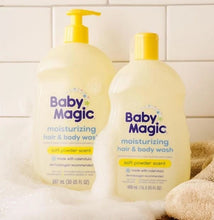 Baby Magic moisturizing hair & body wash, two bottles with yellow pumps on towel