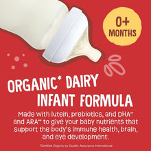 0+ months organic dairy infant formula graphic with bottle and milk splash