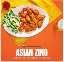Asian Zing sauce wings platter with dipping cucumber cup and small sauce bowl