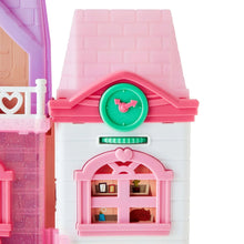 Kid Connection doll house play set, close-up of pink roof, green clock, and front window