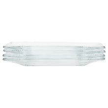 Stack of clear square glass plates, transparent and glossy