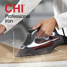 CHI professional iron in use with shiny soleplate and red side stripe