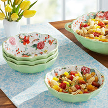 Ceramic pasta bowl set with floral print, mint green bowls on table