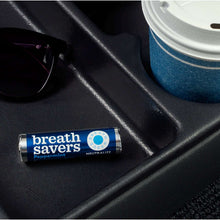 Breath Savers Peppermint sugar-free breath mint roll tube on dark surface