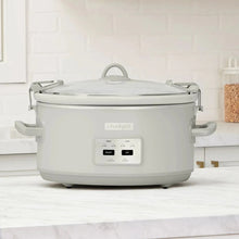 White 7-quart programmable slow cooker with lid and side handles