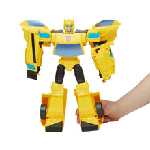 Yellow and blue robot action figure with black wheel-style legs and wing arms.