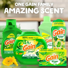 Set of Gain laundry care products with green bottles and dryer sheets