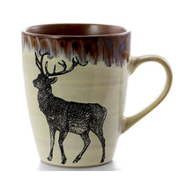 Taupe stoneware mug with black elk silhouette and glossy brown rim