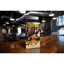 Ground coffee bag displayed in store with Kodiak Attack label