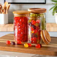 Mixed fruit snack gummies in clear jars with wooden lids