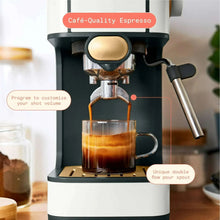 Espresso machine pouring crema into a cup from the filter basket spout
