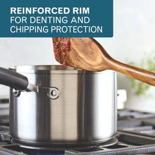 Stainless stockpot with reinforced rim and wooden spatula