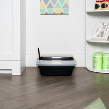 Open-top cat litter box with scoop, light blue rim and black pan, empty interior