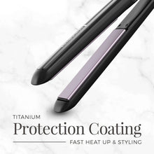 Black flat iron with purple ceramic plates and protective coating