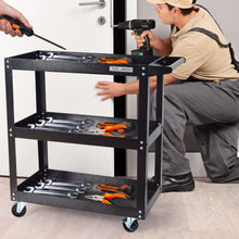 3-tier rolling tool cart with three shelves holding wrenches and screwdrivers, black