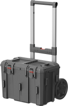 Dark gray rolling toolbox with telescoping handle, side latch panels, and large wheel