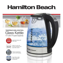 Electric glass temperature-control kettle with black handle and blue water inside