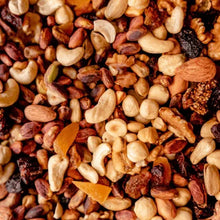 Roasted cashews heap, whole pieces with browned skins and edges