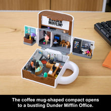 Coffee-mug shaped compact open to a mini Dunder Mifflin office layout
