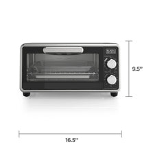 Compact stainless steel air fryer toaster oven with front glass door and control knobs