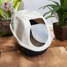 Enclosed cat litterbox with white top, navy bottom, and open front entrance.
