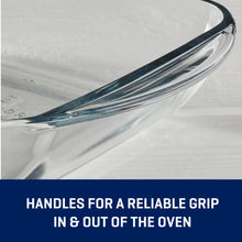 Clear glass baking dish with blue-tinted rim and side handles
