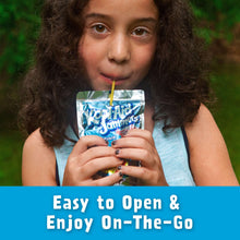 Kool-Aid Jammers Tropical Punch drink pouch held by a child with blue packet front