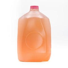 Strawberry lemonade gallon jug with pink cap and embossed sides
