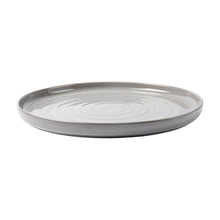 Grey stoneware round dinner plate with raised rim and concentric swirl pattern
