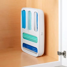 Wall-mounted white 5-slot food bag dispenser with blue and green slot bars