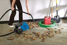 Blue canister vacuum cleaner with floor nozzle and flexible hose