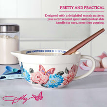 Ceramic batter bowl with floral mosaic print, curved spout, and comfort handle
