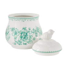 Green floral stoneware sugar bowl with matching lid, bird finial