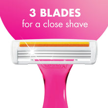 3-blade razor head on a pink handle, close-up view