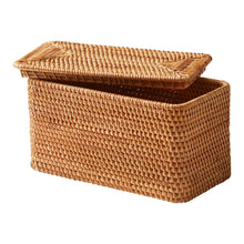 Brown rattan organizer basket with hinged lid, woven sides and rounded top.