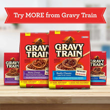 Assorted Gravy Train dog food bags on display with red Try MORE banner