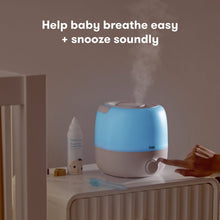 3-in-1 humidifier and nightlight on tabletop, blue and white with mist output