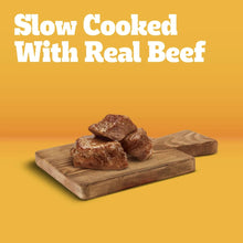 Slow-cooked real beef food promo with beef pieces on a wooden serving board