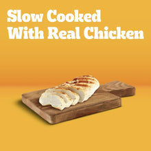 Slow-cooked real chicken dog food graphic with sliced chicken on a wooden board