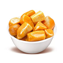 Bowl of orange cut yams in syrup, diced sweet potato pieces