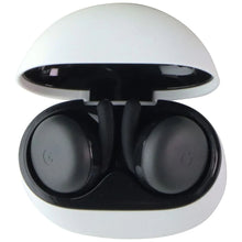 Charcoal wireless earbuds in open charging case, close-up of earbud domes