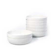 White porcelain dinner bowls, stacked set with smooth round bowl shape