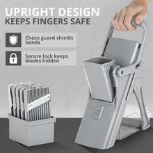 Gray upright mandoline slicer with blade guard, lock, and collection bin