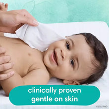 Baby on changing pad while a caregiver uses wipes, clinically proven gentle on skin banner