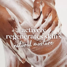 Foamy body wash lather on hands with regenerates skin natural moisture text
