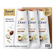 Dove pampering body wash 3-pack bottles, white with brown caps and vanilla flower graphic