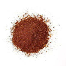 Taco seasoning spice powder heap, fine brown granules